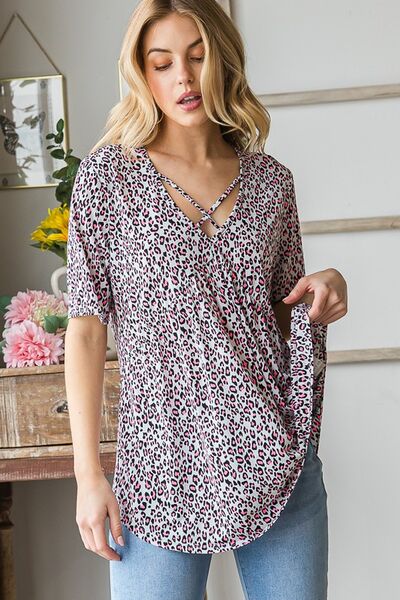 Heimish Full Size Short Sleeve Crisscross Animal Babydoll Top Plus Size Blouses