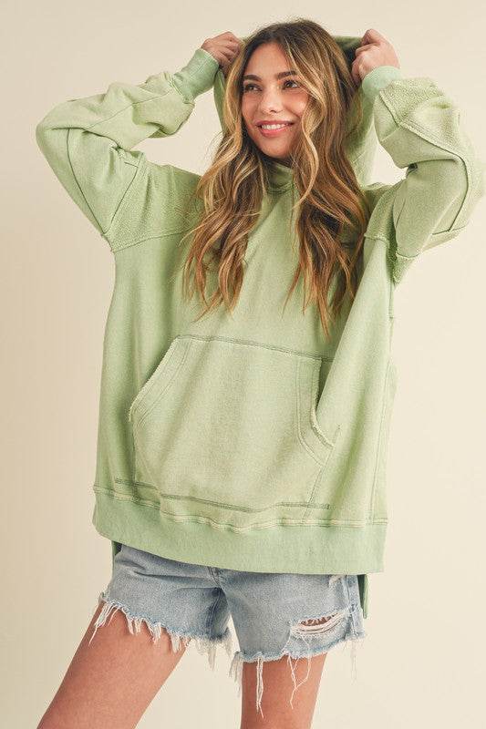 Aemi + Co Exposed Seam Side Slit Hoodie with Kangaroo Pocket - Shop Style & More | Fresh Looks, Everyday Deals & Free Shipping