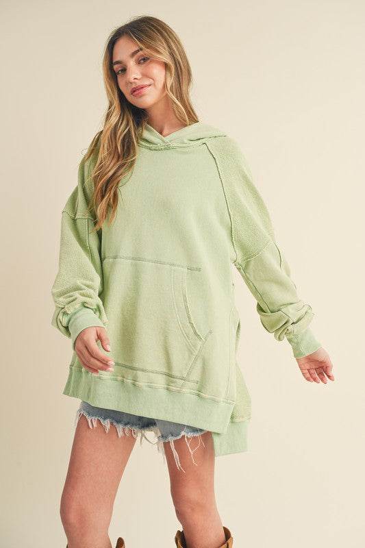 Aemi + Co Exposed Seam Side Slit Hoodie with Kangaroo Pocket - Shop Style & More | Fresh Looks, Everyday Deals & Free Shipping